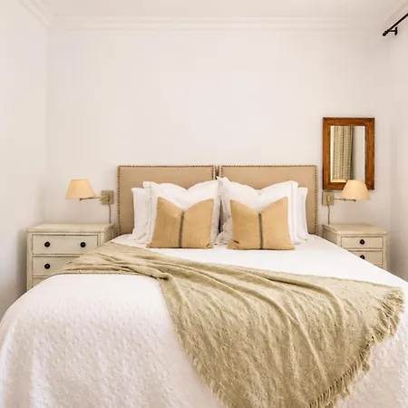 Relaxed Mediterranean Living With A Private Garden & Beachside Location *